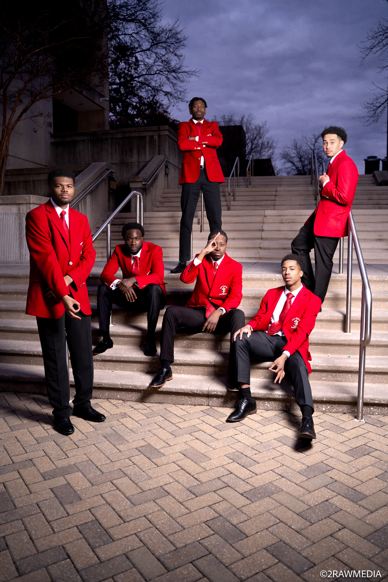 Theta Chi brothers in crimson blazers